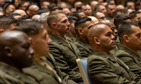 Marines with the Warrant Officer Basic Course 1-24, sit during their graduation ceremony on Marine Corps Base Quantico, Virginia, on 1 February 2024. The direct-accessions program for select candidates to directly enlist into the service up to the rank of gunnery sergeant (E7) should be expanded into the warrant officer ranks for exceptionally qualified technical experts.
