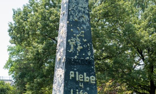 The greased Herndon monument before the climb begins. 