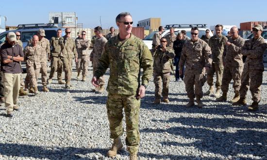 Admiral McRaven, as commander of U.S. Special Operations Command, speaks to members of Special Operations Task Force–Southeast in Camp McCloskey, Logar province,      Afghanistan on Thanksgiving day, 2013.