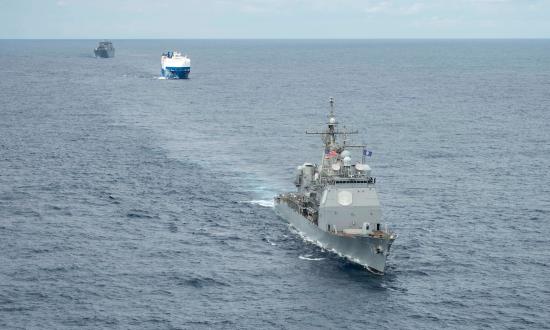 The USS Vella Gulf (CG-72) escorts the MV Resolve and USNS Benavidez (T-AKR-306) across the Atlantic as part of Exercise Defender 2020.