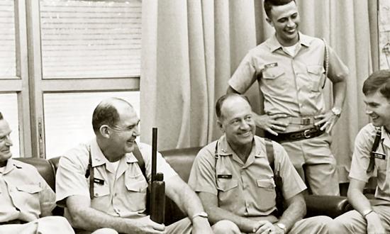 COMNAVFORV Headquarters Staff, Saigon, 31 January 1968. Left to right: Captain Orme, Rear Admiral William Hiram House, Rear Admiral Kenneth Veth, Lieutenant (junior grade) Sam Miess, and then-Lieutenant (junior grade) Moore.
