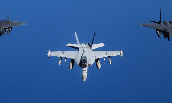 A pair of Air Force F-15Es and a Navy EA-18G fly in Central Command in May 2024. Similar to the Air Force, the Navy should expand flying opportunities for midcareer aviators.