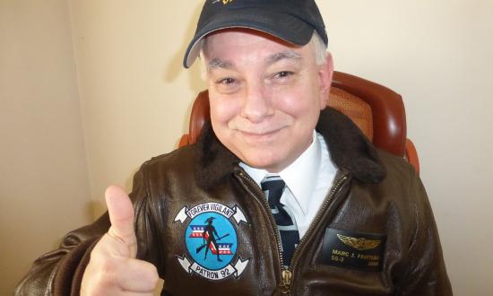 The author in his prized leather flight jacket. Rather  than echoing aviation’s flight jacket, perhaps the  surface warfare community should come up  with its own distinctive jacket.