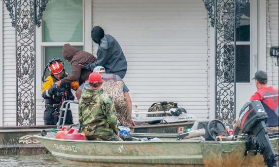 Members of the "Cajun Navy" perform a rescue