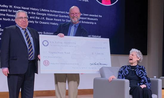 (From left) Historian David Rosenberg, U.S. Naval Institute Chief Financial Officer Chip Wallen, and historian Virginia Steele Wood gather at the Naval Institute’s Jack C. Taylor Conference Center for the 2025 Knox Awards ceremony.