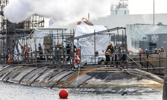 The USS John Warner (SSN-785) at Norfolk Naval Shipyard for her CNO Extended Dry-Docking Selected Restricted Availability. The Navy should create a shipyard career path for submarine officers. 