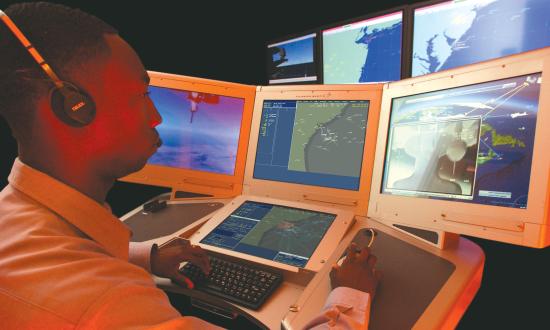 Technician sitting at a ComBaTSS-21 console