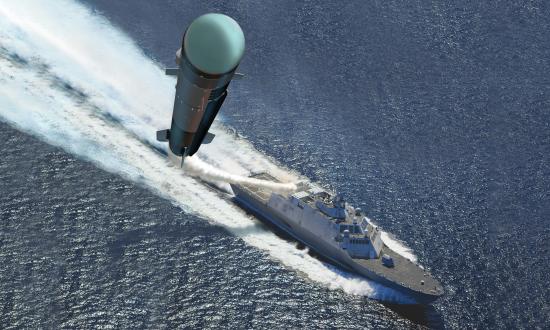 Concept art of a Navy littoral combat ship launching a AGM-114L Longbow Hellfire missile