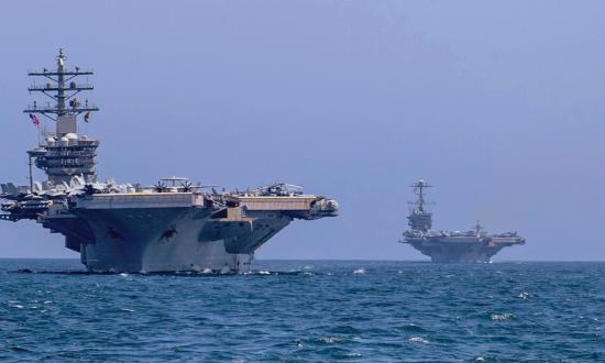 The USS Dwight D. Eisenhower (CVN-69), left, and the USS Harry S. Truman (CVN-75) in the Arabian Sea in March.