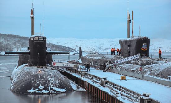 Nuclear-powered ballistic missile submarines K-114 Tula, left, and Yury Dolgorukiy are parked at the Northern Fleet submarine forces headquarter in Gadzhiyevo, Murmansk region, Russia