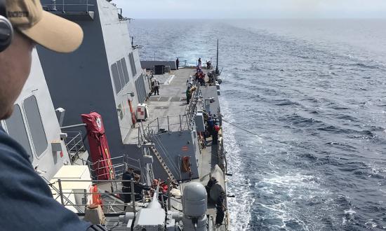 The guided-missile destroyer USS Oscar Austin (DDG-79) refuels with the fleet oiler USNS John Lenthal (AO-189) in the North Atlantic during exercise Nautical Twilight in August 2023.