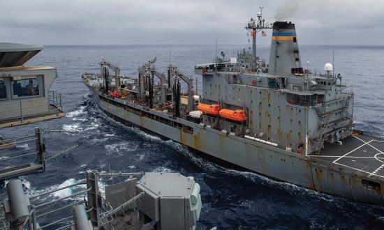 The fleet replenishment oiler USNS John Ericsson (T-AO-194) prepares to transfer fuel to the USS Ronald Reagan (CVN-76) in the Philippine Sea in May.