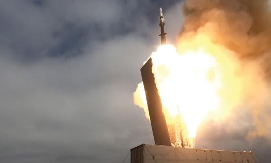 The USS Savannah (LCS-28) fires an SM-6 missile from a containerized launching system as part of a series of experiments integrating government and businesses to deliver new capabilities.
