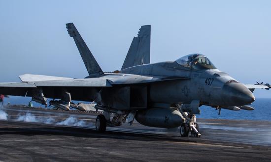 An F/A-18E Super Hornet launches from the USS Dwight D. Eisenhower (CVN-69). When squadrons in the Red Sea asked for approval to carry more AIM-9X air-to-air missiles, program office and industry collaboration achieved flight clearance in just seven days.