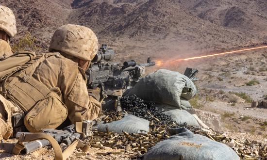Marines provide suppressive fire atop machine gun hill during an integrated training exercise at Marine Corps Air Ground Combat Center, Twentynine Palms, California. New technology is not rigorously tested during routine training events. For example, at a recent integrated training exercise, Tomahawk Robotics’ Radio Agile Integrated Device was hardly used.