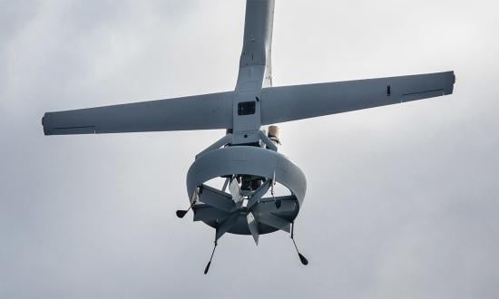 The V-BAT 128 unmanned aerial system performs a vertical landing on the flight deck of the amphibious transport dock ship USS Arlington (LPD-24). Assuming a V-BAT costs $500,000, the Marine Corps could purchase almost 278 V-BATs for the price of eight MQ-9A Reaper drones.