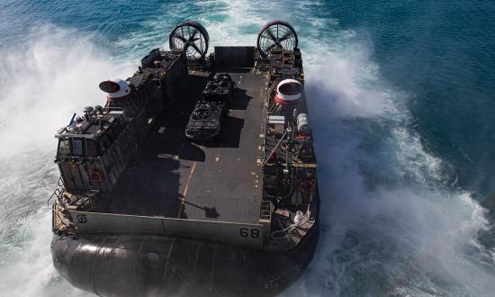 A landing craft, air cushion (LCAC), transports equipment to the amphibious assault ship USS Kearsarge (LHD-3). The LCAC would be ideal for an abandon-ship rescue in which survivors would likely be spread out over a large area.