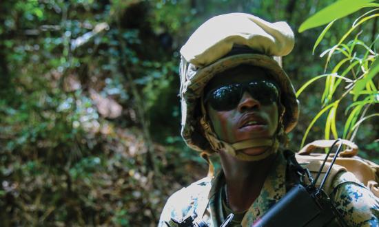 A Marine with Combat Logistics Battalion 31, 31st Marine Expeditionary Unit, provides security at the Jungle Warfare Training Center, Camp Gonsalves, Okinawa, Japan, May 22, 2018