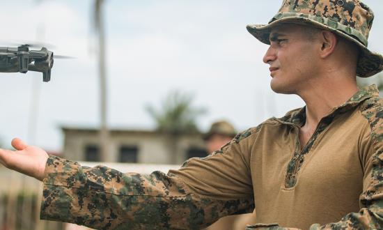 A Marine Corps intelligence specialist from the 15th Marine Expeditionary Unit launches an Anafi Parrot unmanned aerial vehicle during an exchange with Philippine Marines in October 2024. Marine Corps intelligence forces must be forward, focused, and persistent to detect the environment and adversary intentions.