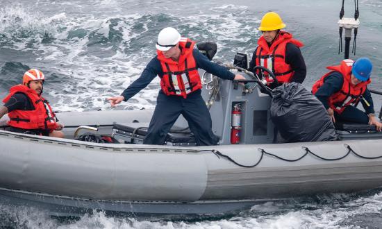 Sailors assigned to amphibious assault ship USS Tripoli (LHA-7) operate a 7-meter rigid-hull inflatable boat (RHIB) in May 2024. The 7-meter RHIB has been in service since the early 1990s and has performed well, despite being assigned missions beyond what were anticipated.