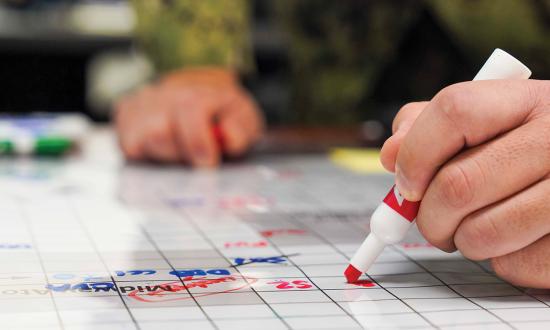 A U.S. Naval War College wargame in January 2025. Artificial intelligence would significantly improve wargame play and lessons, as it is ideally suited to solving complex optimization problems—exactly the type of problems wargaming presents.