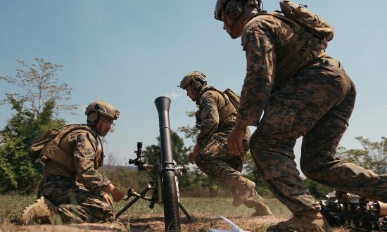 Marines with 1st Light Armored Reconnaissance (LAR) Battalion, attached to Marine Rotational Force–Southeast Asia, fire an M252 81-mm mortar system during exercise Cobra Gold 2025 at Ban Chan Khrem, Chanthaburi, Thailand, in March. LAR capabilities align better with the mission and tasks of littoral combat teams and expeditionary advanced base operations.