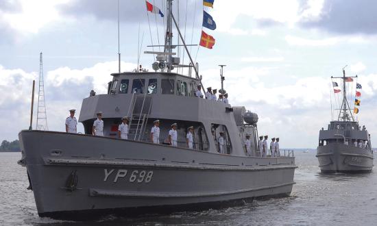 U.S. Naval Academy midshipmen train on board a yard patrol (YP) craft. The Navy should purchase YPs for the fleet so junior SWOs could hone their skills on the water in a controlled environment, complementing virtual training in ashore simulators and improving SWO training across the fleet.