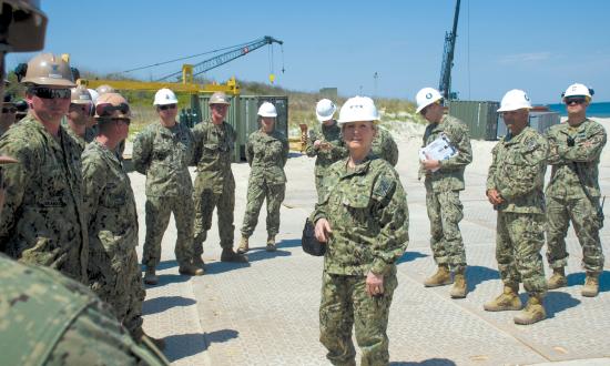 Vice Admiral Robin Braun, Commander of Navy Reserve Force and Chief of Navy Reserve, tours an elevated causeway system at Anzio Beach, Ital