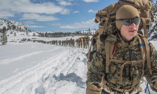 Marine prepares for a conditioning hike during a deployment for training exercise at Mountain Warfare Training Center, Bridgeport, CA