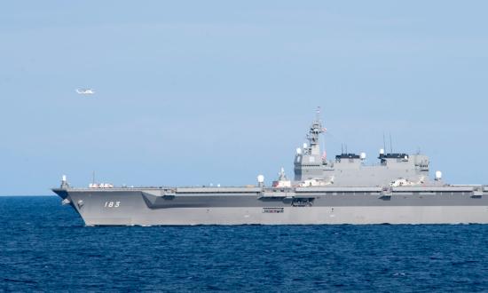  JS Izumo transits the South China Sea while doing maritime operations with a U.S. surface action group.
