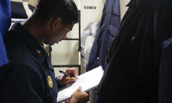 A sailor on the USS Ramage (DDG-61), conducts a berthing inspection. Good sleep is foundational to health, and the design of a sleeping space can directly affect sleep quality.