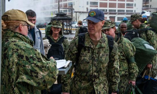 Navy reservists reporting to the hospital ship USNS Comfort ( T-AH-20) in Norfolk, Virginia, prior to its deployment to New York City last spring.