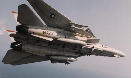 An F-14 Tomcat from VF-41, embarked on board the USS Theodore Roosevelt (CVN-71), flies combat air patrol during Operation Desert Storm.