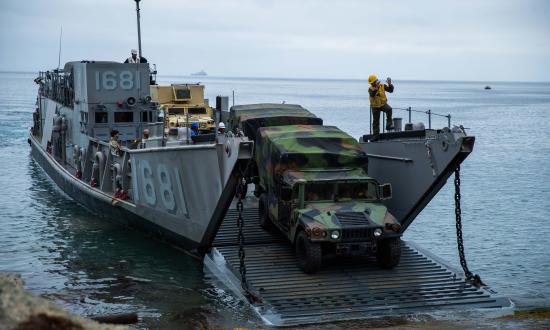  Marine unload equipment and personnel form a landing craft utility. 