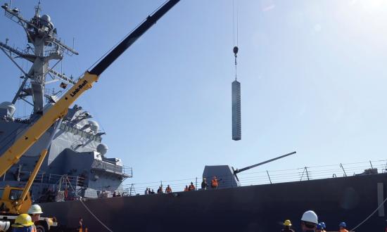 Warships are most vulnerable when they have limited ability to maneuver—such as when pierside, saddled by cranes onloading thousands of pounds of ordnance.