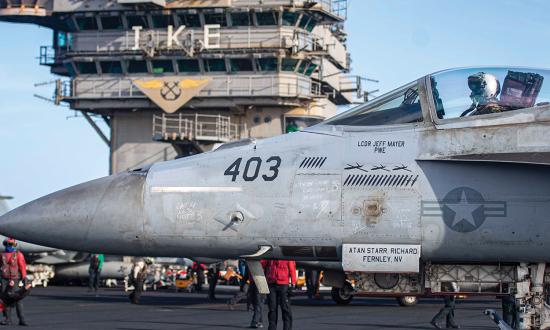 An F/A-18E Super Hornet attached to Strike Fighter Squadron 105 (note the drone silhouettes) on the flight deck of the USS Dwight D. Eisenhower (CVN-69) in the Red Sea. The Eisenhower Carrier Strike Group is conducting combat operations against Houthi rebels.