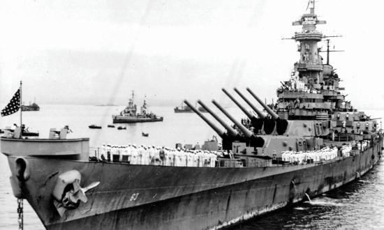 Port bow view of USS Missouri (BB-63) during the Japanese surrender ceremony in Tokyo Bay