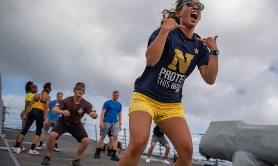 Ensign Adrienne Wang participates in a physical fitness challenge on board the guided-missile destroyer USS Michael Murphy (DDG-112).