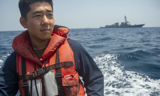 Ensign James Ahn, attached to the guided-missile destroyer USS James E. Williams (DDG-95), participates in small-boat operations in the U.S. Fifth Fleet area of operations.  