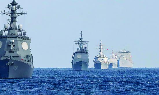 From left to right, the Japan Maritime Self-Defense Force guided-missile destroyer Ashigara, the USS Shiloh (CG-67), the Rafael Peralta (DDG-115), the Antietam (CG-54), and the USNS Washington Chambers (T-AKE 11) in formation in the Philippine Sea, in January 2023. 