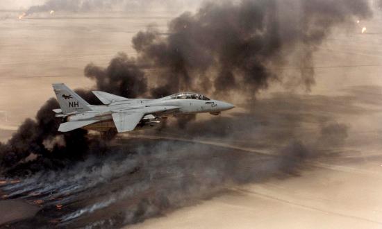 An F-14 Tomcat flies over Kuwait during Operation Desert Storm