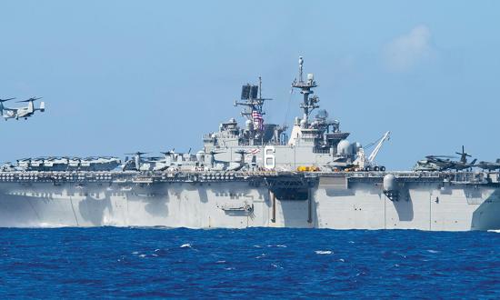 An MV-22B Osprey takes off from the amphibious assault ship USS America (LHA-6). Integrated U.S. naval power—modeled by Task Force 76/3 in the western Pacific—provides broader options for contingency and crisis response, as well as in conflict.