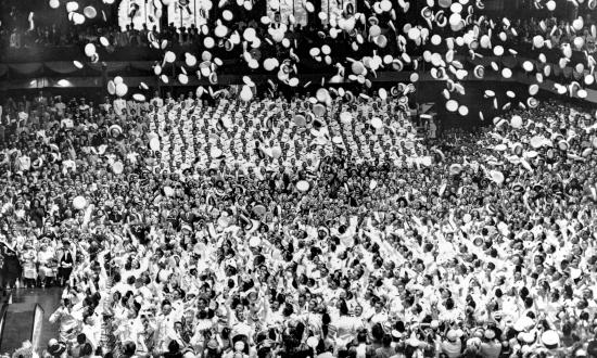 Members of the Naval Academy Class of 1955 celebrate their graduation.