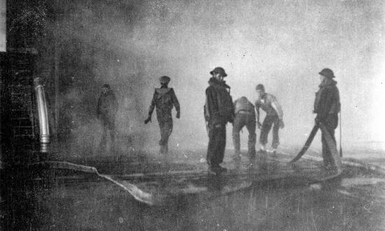Firefighting efforts aboard the stricken USS Yorktown's (CV-5) flight deck