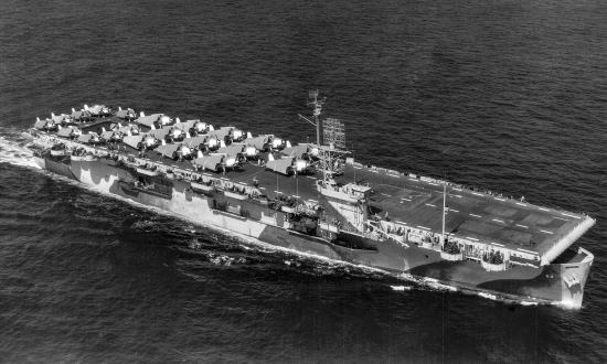 Aerial starboard bow view of the USS Guadalcanal (CVE-60) underway in the Atlantic Ocean