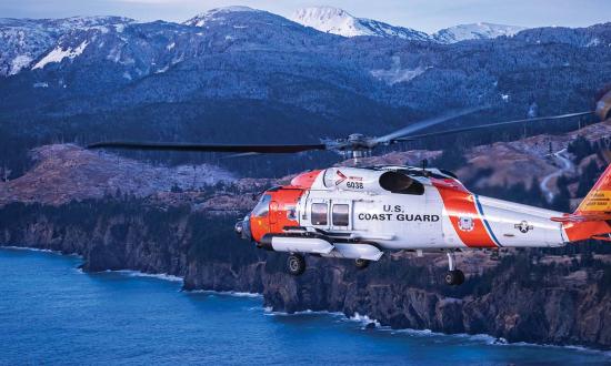 An Air Station Kodiak MH-60T Jayhawk flying near  Kodiak. In November, the Coast Guard accepted the first new-manufacture MH-60T hull from Sikorsky. The new hulls will extend the service life for the medium-range recovery helicopter fleet through the 2030s.