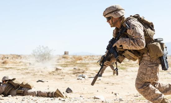 A U.S. Marine with 4th Light Armored Reconnaissance Battalion, 4th Marine Division, runs toward a target on a live-fire range during 4th LARs Marine Corps combat readiness evaluation at Marine Corps Air Ground Combat Center, Twentynine Palms, California, in September 2023. Marines at every command echelon must develop the elements necessary to face the inherent qualities of ground combat and the nature of war.