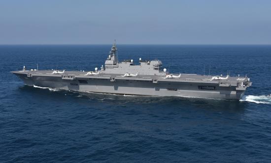 Port beam view of the helicopter-carrying Japanese destroyer Izumo (DDH-183) underway at sea.