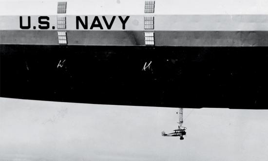 Waco N2Y-1 hooking on to the trapeze of USS Akron (ZRS-4)