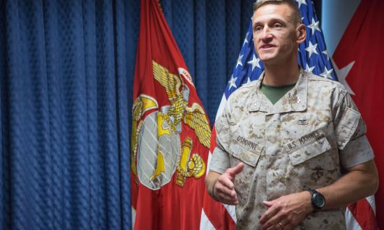 The assistant chief of staff (G-4) for Marine Corps Installations Command gives remarks at the Pentagon after his promotion.